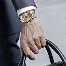 Rolex skydweller rose gold chocolate dial oysterflex 326235. The Rolex Sky Dweller In Steel And Yellow Gold 42 Mm Case Champagne Colour Dial Oyster Bracelet The Sophistic Traveller Watch Luxury Watches For Men Rolex