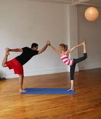 A Couples Yoga Routine Your Guy Will Actually Love Couples Yoga Partner Yoga Poses Yoga Poses For Two