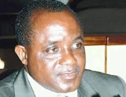 This was Mr Catling pictured at the radio, at start of his tour in 1954, in  the height of the Emergency (Kenya Police Review), together with a couple  of much later newspaper