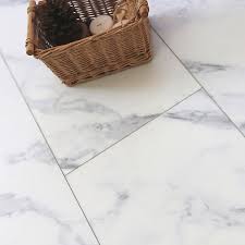 Save big with everyday low prices on vinyl for all your favorite bands! Showhome White Marble Effect Luxury Vinyl Flooring Tile 2 16m Pack Diy At B Q