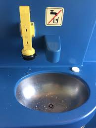 sink in bathroom with powder soap