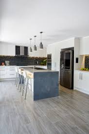 Installing a door with a hinge on the top, rather than on the side, can work in smaller clearances for a wider wall cabinet. Before After Cherrybrook Freedom Kitchens