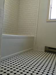 #whitelanedecor @whitelanedecor master bathroom ideas, white octagon and dot tile, subway tile shower, rain head shower, spa shower. Pin On Our Work Tile
