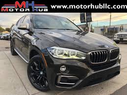 How many quarts and liters of engine oil is required for an oil change involving replacement of oil filter for a bmw x6 cars. 2015 Bmw X6 Xdrive50i Stock F93651 For Sale Near Van Nuys Ca Ca Bmw Dealer