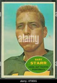 Green Bay Packers quarterback Bart Starr, center, and actor Dennis Weaver,  right, rehearse a scene, April 16, 1968 in Miami, Florida, during filming  of a ?Gentle Ben? TV episode. The segment featuring