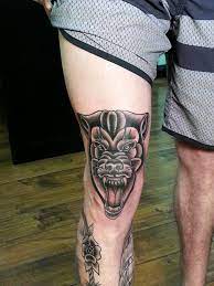 Wolf On The Kneecap By Paul Reza At Old Towne Tattoo Parlor In Orange California Skull Tattoo Tattoos Flower Tattoo