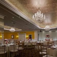 The hotel lobby features marble floors and paneled walls. Hotel The Ritz Carlton Kuala Lumpur Malaysia Bei Hrs Gunstig Buchen