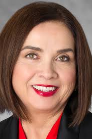 Nancy Worlie cleans house at KPBS