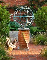Bronze Armillary Sphere In A Classic Garden With Unusual Brick Plinth Garden Spheres Armillary Sphere Brick Garden