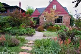Shown here during early spring with both new leaves and flowers. Case Study Perennial Garden With Japanese Maple Creative Landscapes Inc