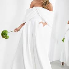 Golden vibes photo and her talented team of wedding vendors made their 60s inspired wedding dreams come to life! 20 Best Wedding Jumpsuits Of 2021