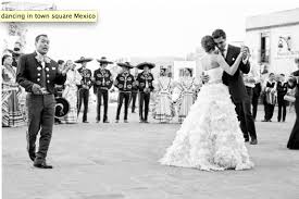 The Couple Dancing To The Mariachis Mexican Wedding Traditions Mariachi Wedding Mexican Wedding