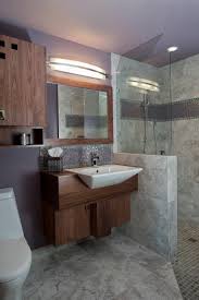 Amazing gallery of interior design and decorating ideas of lavender bathroom walls in bedrooms, living rooms, girl's rooms. Lavender Midcentury Modern Bathroom With Gray Marble Tile And Purple Tile Accent Strip Hgtv