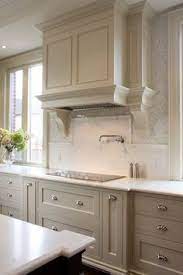 I am imagining something warm, but not yellow. 8 Best Tan Kitchen Cabinets Ideas In 2021 Kitchen Cabinets Kitchen Remodel New Kitchen