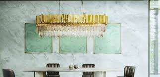 A crystal chandelier is usually considered more traditional, while iron can have an industrial edge. How To Place The Perfect Chandelier In Your Dining Room