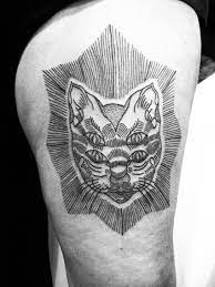 Cat tattoos are not restricted to any cats are famous for their attractive and colorful eyes. 4 Eyes Cat Ratatattoo