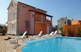 Guests can relax in the garden at the property. Apartment Porec Porec Private Pool Air Conditioning