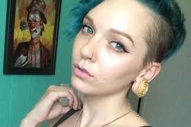 Cancer survivor 'reclaims body' with floral tattoo across her breasts