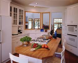 A spacious loft could be added above the bedrooms for storage or a bonus room. Small Kitchen Design Open Concept