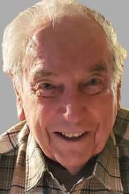 John E. Kennedy 1928-2023