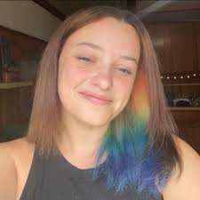 Why is my female cat acting aggressively towards my male cat after grooming?