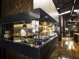 Code Black Coffee Two Melbourne Warehouses Merge To Create Industrial Chic Cafe And Roastery Australian Interior Design Cafe Design Restaurant Kitchen Design