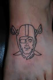 Oakland raiders and smoke logo tattoo on arm. 52 Best Oakland Raiders Tattoos