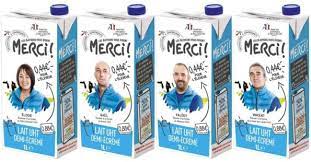 Le nom et la photo de l'agriculteur s'affichent sur la brique : Grand Succes Chez Netto Pour Sa Gamme De Lait Les Eleveurs Vous Disent Merci