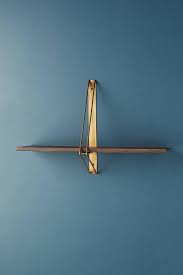 See more ideas about brown living room, dark furniture, brown living room decor. Abbott Angled Brass Dark Wood Wall Shelf