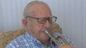 Elderly man finds joy in playing the trumpet