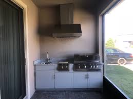outdoor kitchen with range hood