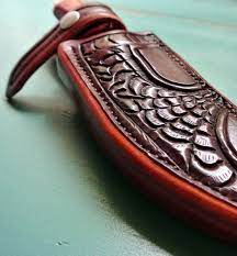 I like the rustic look of the oil tanned leather. Hand Made Leather Knife Sheath Albany Addition By Strong Horse Leather Custommade Com