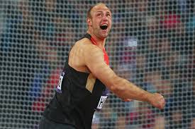 Discus definition, a circular disk more than 7 inches (18 centimeters) in diameter and 2.2 pounds (1 kilogram) in weight, usually wooden with a metal rim and thicker in the center than at the edge, for throwing for distance in athletic competition. London 2012 Event Report Men S Discus Throw Final Report World Athletics