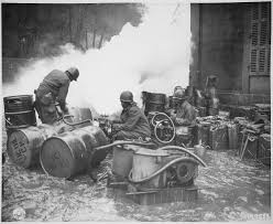Soldiers Of The 161st Chemical Smoke Generating Company U S Third Army Move A Barrel Of Oil In Preparation To Re American Soldiers History Pictures Germany