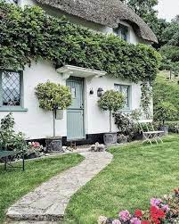 Pin By Robin Littrell On Golliwogs English Cottage Exterior Cottage Exterior English Cottage Style