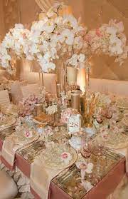 A Gorgeous Pink And Champagne Wedding Tablescape B Lovely Events Champagne Wedding Rose Gold Wedding Wedding Tablescapes