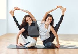 Hatha yoga is a holistic way of achieving the mastery over your body and mind. Zwei Junge Frauen Tun Yoga Asana Kompass Pose Leinwandbilder Bilder Tandem Asana Haltung Myloview De