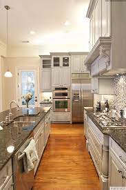 Galley Kitchen Ideas Real With Steel Glossy Surfaces And All Contemporary Appliances Ikea Kit Long Narrow Kitchen Luxury Kitchen Design Kitchen Designs Layout