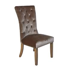 The grey colour is perfectly on trend, whilst the stud details add a timeless finish. Vicenza Taupe Velvet Dining Chair With Lion Knocker