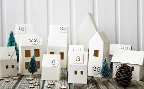 Christmas Themed Village Made Out Of White Paper Christmas Advent Calendar Advent Calendar Homemade Advent Calendars