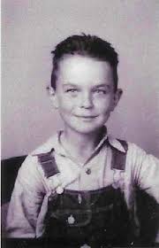 I was recently given this photo of my father and his classmates when he was  in middle school. I attended the same school and have a photo of my class,  taken at