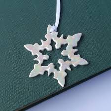 Choose a theme to match your holiday personality. Porcelain Mother Of Pearl Snowflake Christmas Decoration By Melissa Choroszewska Ceramics Notonthehighstreet Com