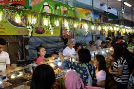 A market in a traditional malay kampong house: What To Eat At Geylang Serai Bazaar 2018 9 Stalls Worth Braving The Crowds For Shopee Blog Shopee Singapore
