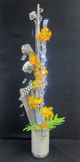 Reflective With Illuminosity Contemporary Flower Arrangements Flower Centerpieces Flower Arrangements