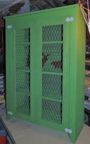 This shaker style solid wood jelly cabinet features stepped molding and a picture frame cupboard door with wooden knob. Jelly Cabinet Pie Safe Ana White