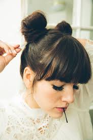 Hair tutorial step by step: Twisted Double Buns Tutorial Come To Yoga With Me Love Taza Rockstar Diaries Hair Bun Tutorial Bun Hairstyles Hairstyles With Bangs