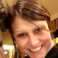 Who is a good local dog groomer in Cadillac for Australian Shepherds with  dual coats?