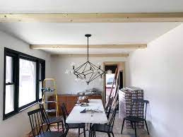 You'll want to pull a chalk line for each beam placement on your ceiling for setting each decorative ceiling beams aren't for every home. How To Install Faux Wood Beams Diy White Faux Ceiling Beams