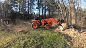 Novak djokovic roland garros 2021 : Kubota L2501 Compact Tractor Using A Grapple And Chipper To Remove And Clean Up Brush Townline Equipment Kubota Dealer In Nh And Vt