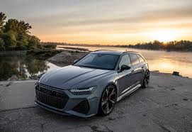 The rs 6 avant rs tribute edition pays homage to the rs 2 with its silver wheels, black roof rails, nogaro blue exterior paint, body color mirrors, red brake calipers, rs sport exhaust, black optic package, and a variety of audi exclusive interior finishes. Absolutely Auditography Unique Audi Photography Facebook